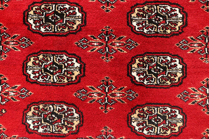 Crimson Pakistani Bokhara Rug 6' 5" x 8' 11" Hand-Knotted | No. QA39092