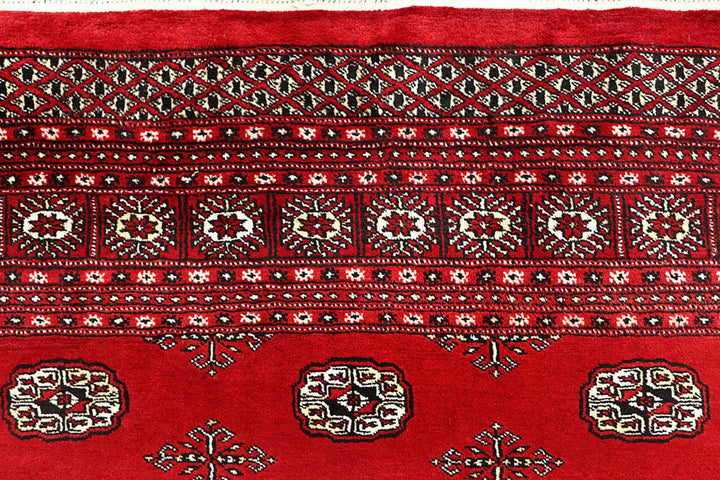 Red Pakistani Bokhara Rug 6' 1" x 9' 2" Hand-Knotted | No. QA39175