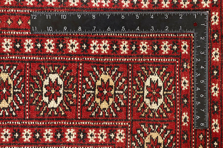Red Pakistani Bokhara Rug 6' 1" x 9' 2" Hand-Knotted | No. QA39175