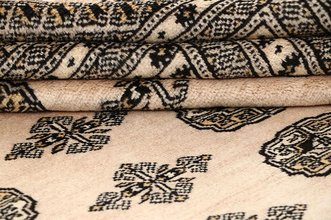 Brown Pakistani Bokhara Rug 9' 4" x 11' 10" Hand-Knotted | No. QA39265
