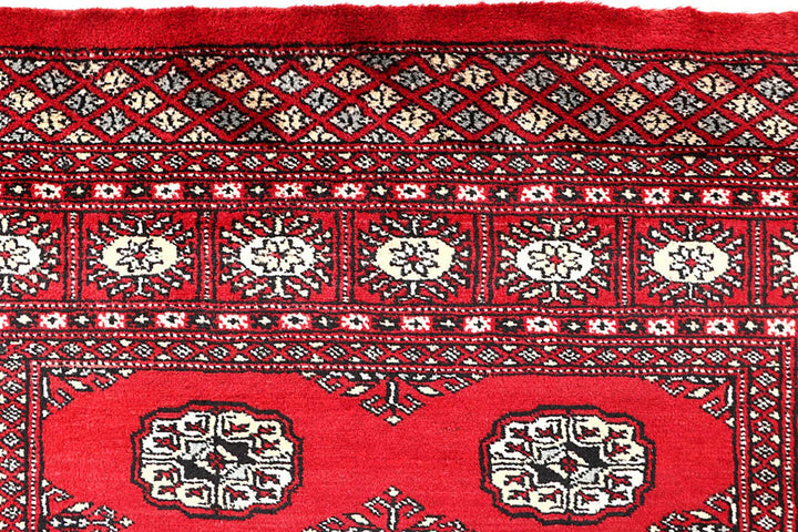 Red Pakistani Bokhara Rug 4' x 6' 8" Hand-Knotted | No. QA39955