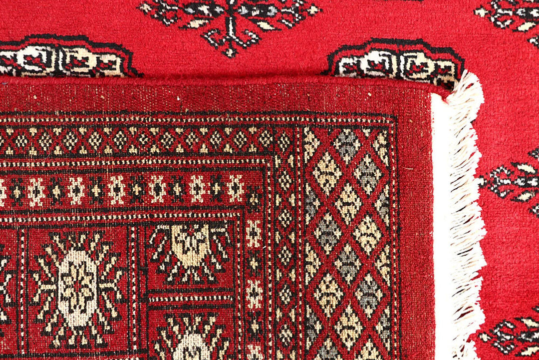 Red Pakistani Bokhara Rug 4' x 6' 8" Hand-Knotted | No. QA39955