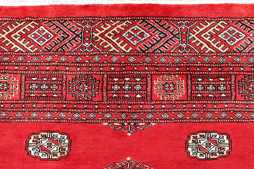 Red Pakistani Bokhara Rug 5' 1" x 7' 10" Hand-Knotted | No. QA39988