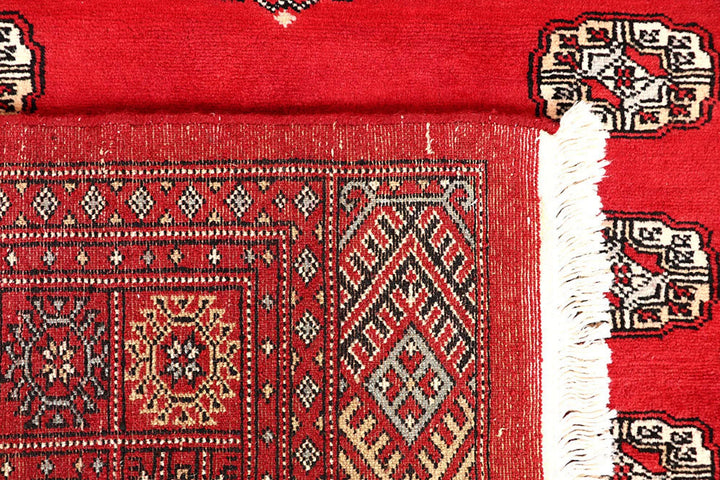 Red Pakistani Bokhara Rug 5' 1" x 7' 10" Hand-Knotted | No. QA39988