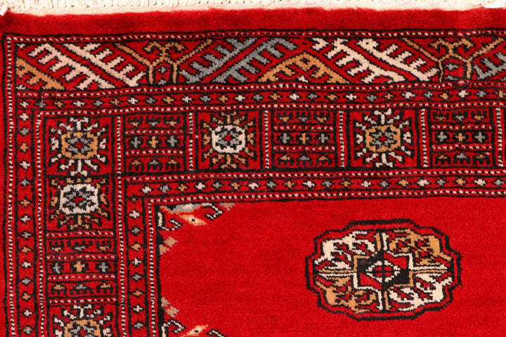 Red Pakistani Bokhara Rug 2' 7" x 9' 1" Hand-Knotted | No. QA40235
