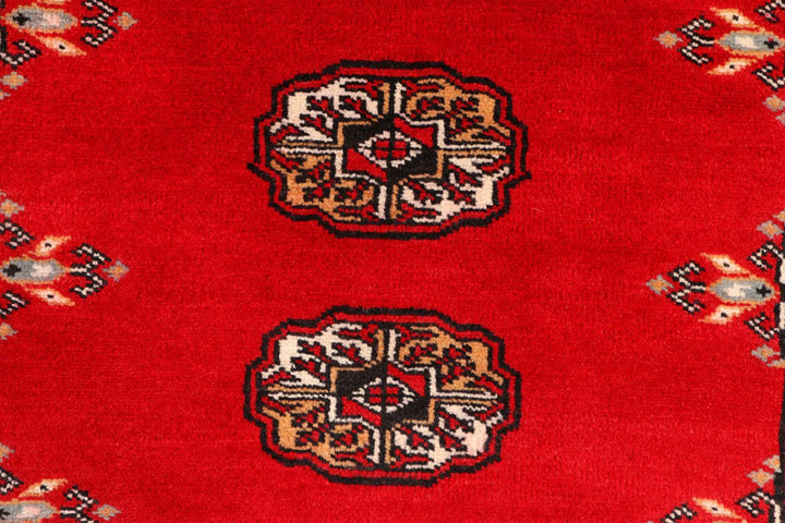 Red Pakistani Bokhara Rug 2' 7" x 9' 1" Hand-Knotted | No. QA40235