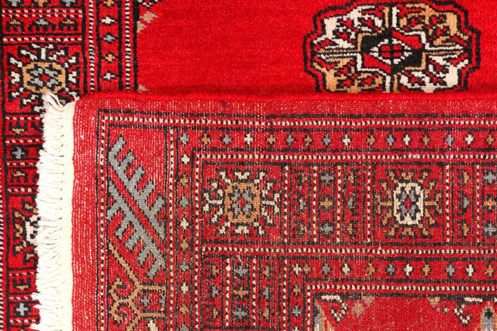 Red Pakistani Bokhara Rug 2' 7" x 9' 1" Hand-Knotted | No. QA40235