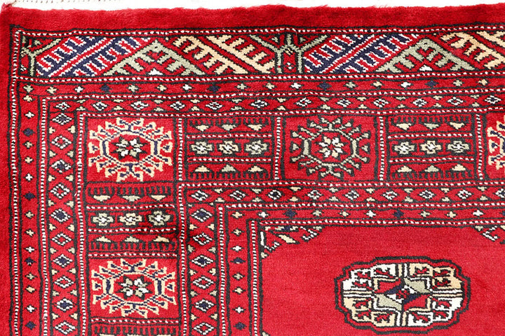 Red Pakistani Bokhara Rug 5' 7" x 8' 3" Hand-Knotted | No. QA40994
