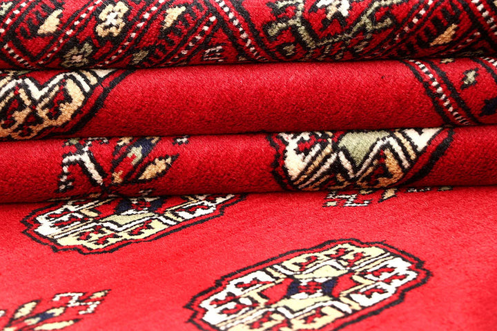 Red Pakistani Bokhara Rug 5' 7" x 8' 3" Hand-Knotted | No. QA40994