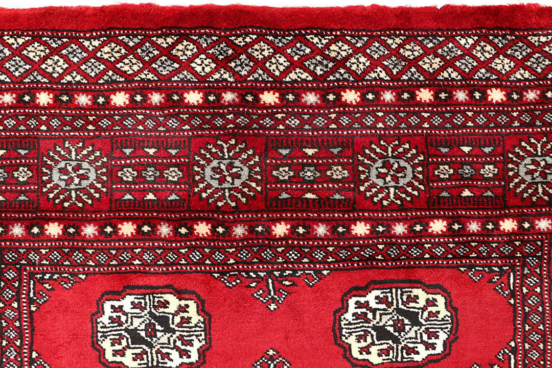 Red Pakistani Bokhara Rug 4' x 7'7" Hand-Knotted | No. QA41406