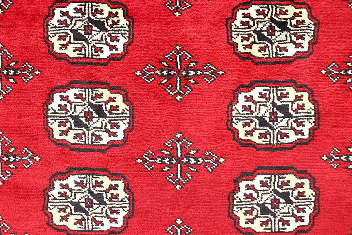 Red Pakistani Bokhara Rug 4' x 7'7" Hand-Knotted | No. QA41406
