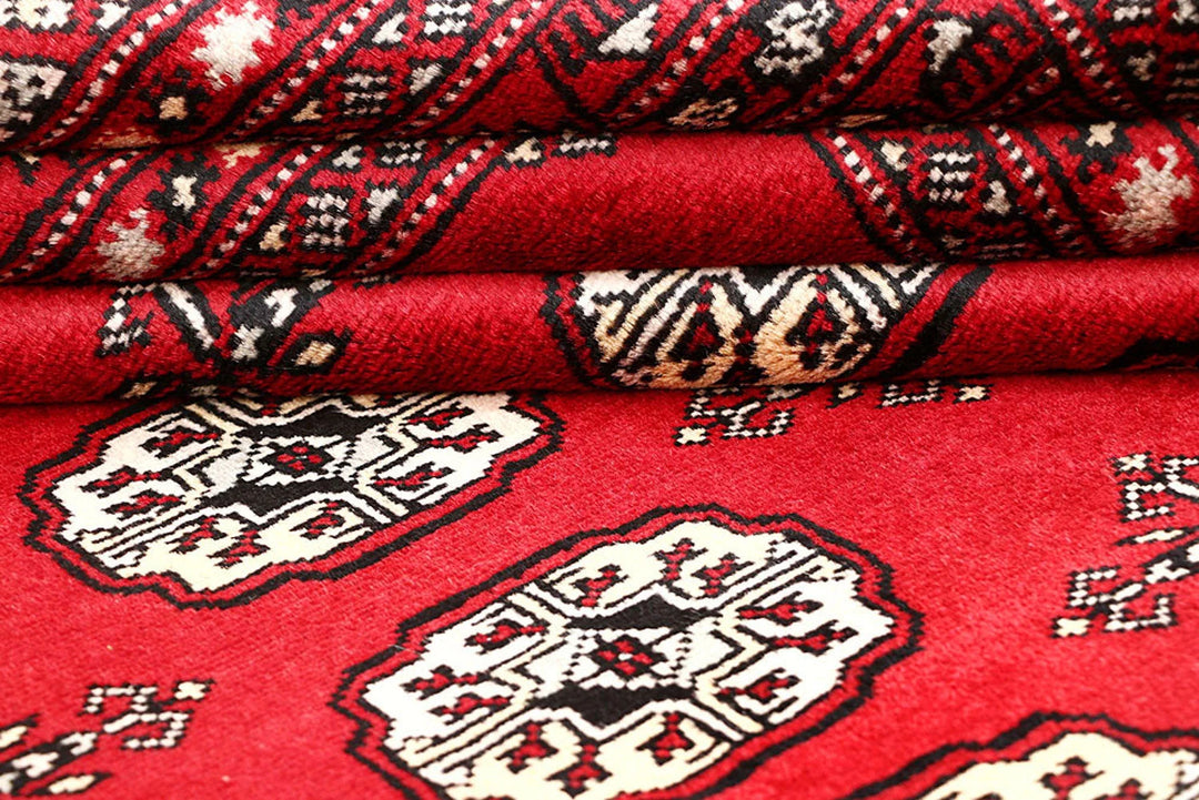 Red Pakistani Bokhara Rug 4' x 7'7" Hand-Knotted | No. QA41406