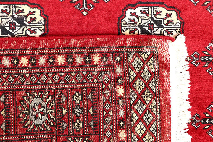 Red Pakistani Bokhara Rug 4' x 7'7" Hand-Knotted | No. QA41406