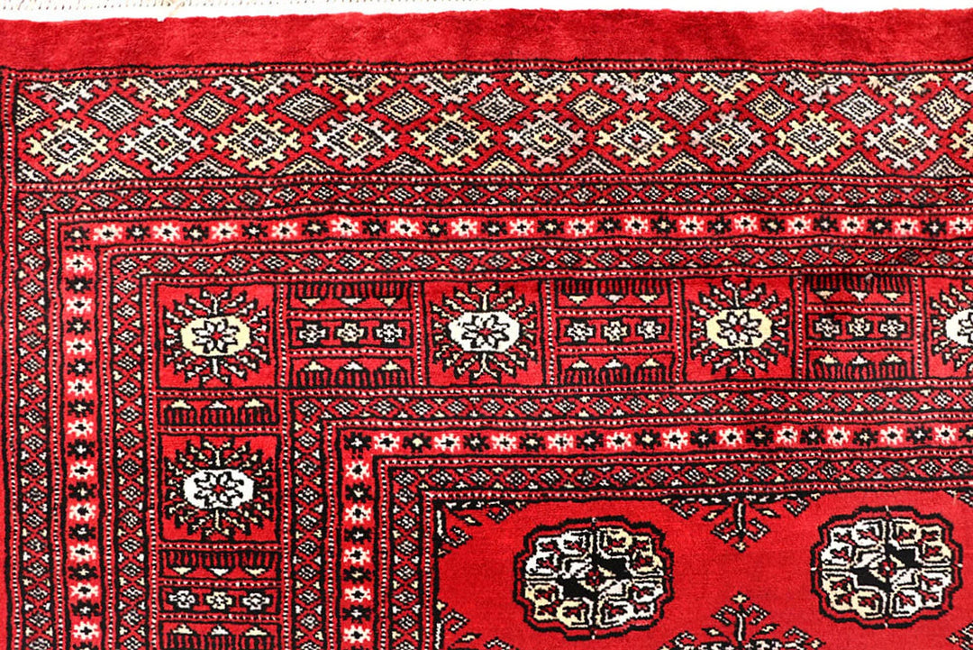 Red Pakistani Bokhara Rug 6' 3" x 9' 3" Hand-Knotted | No. QA41770