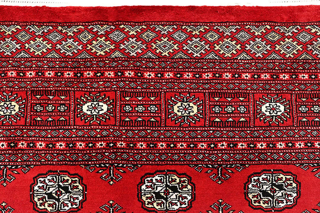 Red Pakistani Bokhara Rug 6' 3" x 9' 3" Hand-Knotted | No. QA41770