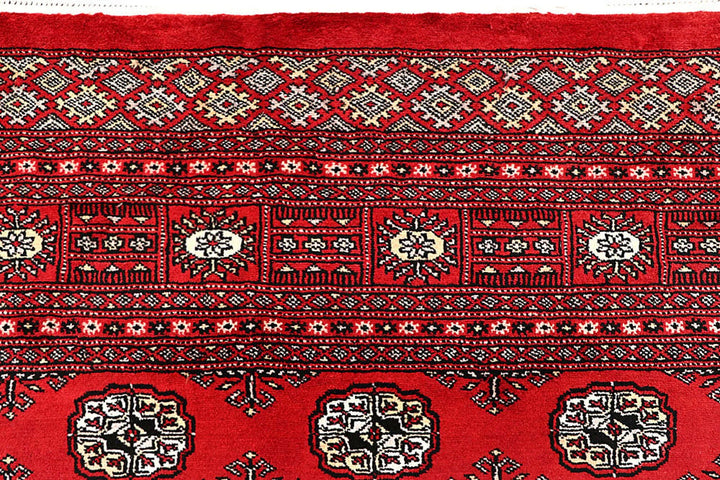 Red Pakistani Bokhara Rug 6' 3" x 9' 3" Hand-Knotted | No. QA41770