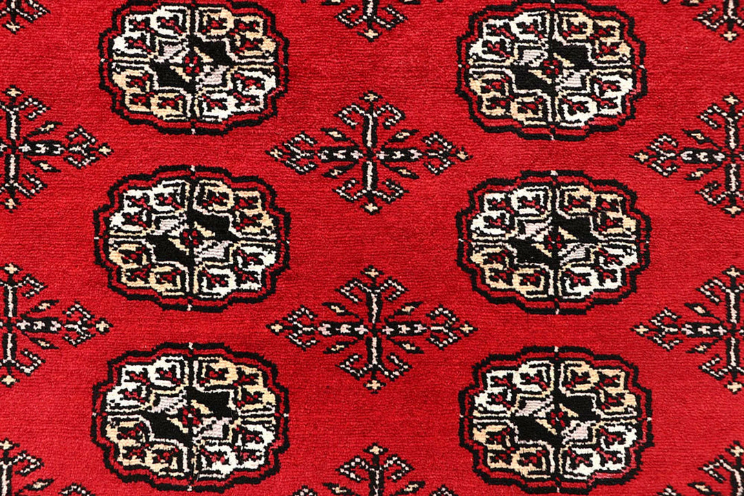 Red Pakistani Bokhara Rug 6' 3" x 9' 3" Hand-Knotted | No. QA41770