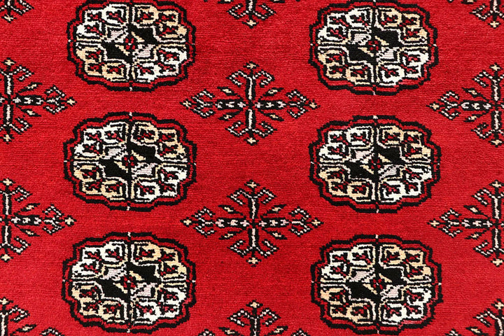 Red Pakistani Bokhara Rug 6' 3" x 9' 3" Hand-Knotted | No. QA41770