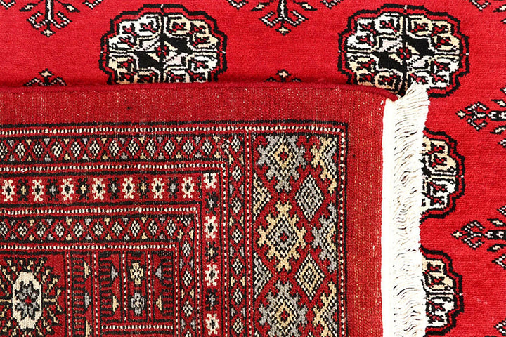 Red Pakistani Bokhara Rug 6' 3" x 9' 3" Hand-Knotted | No. QA41770
