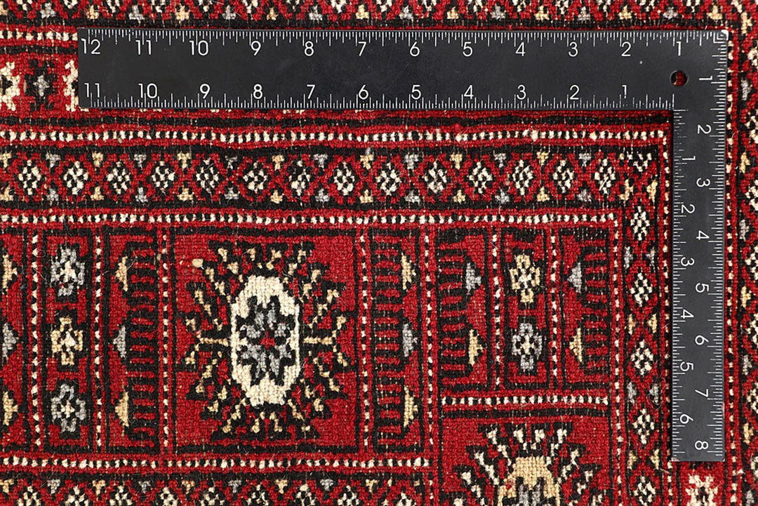 Red Pakistani Bokhara Rug 6' 3" x 9' 3" Hand-Knotted | No. QA41770