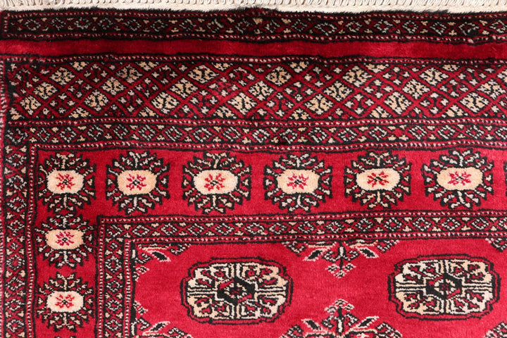 Dark Red Pakistani Bokhara Rug 3' 1" x 5' 4" Hand-Knotted | No. QA41864