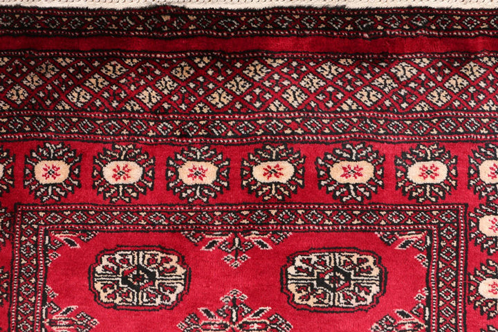 Dark Red Pakistani Bokhara Rug 3' 1" x 5' 4" Hand-Knotted | No. QA41864