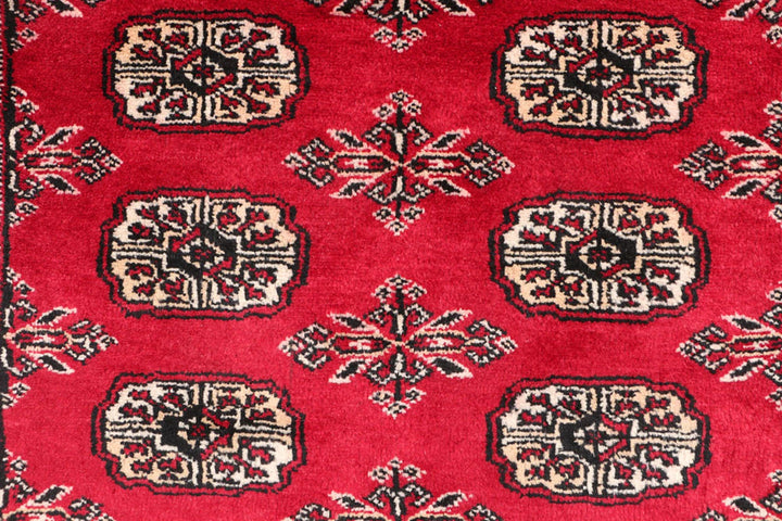 Dark Red Pakistani Bokhara Rug 3' 1" x 5' 4" Hand-Knotted | No. QA41864