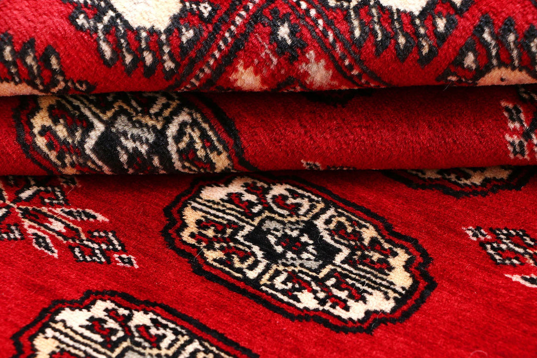 Red Pakistani Bokhara Rug 4' x 5'10" Hand-Knotted | No. QA42729