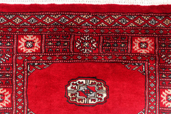 Dark Red Pakistani Bokhara Rug 2' 7" x 8' 8" Hand-Knotted | No. QA42764