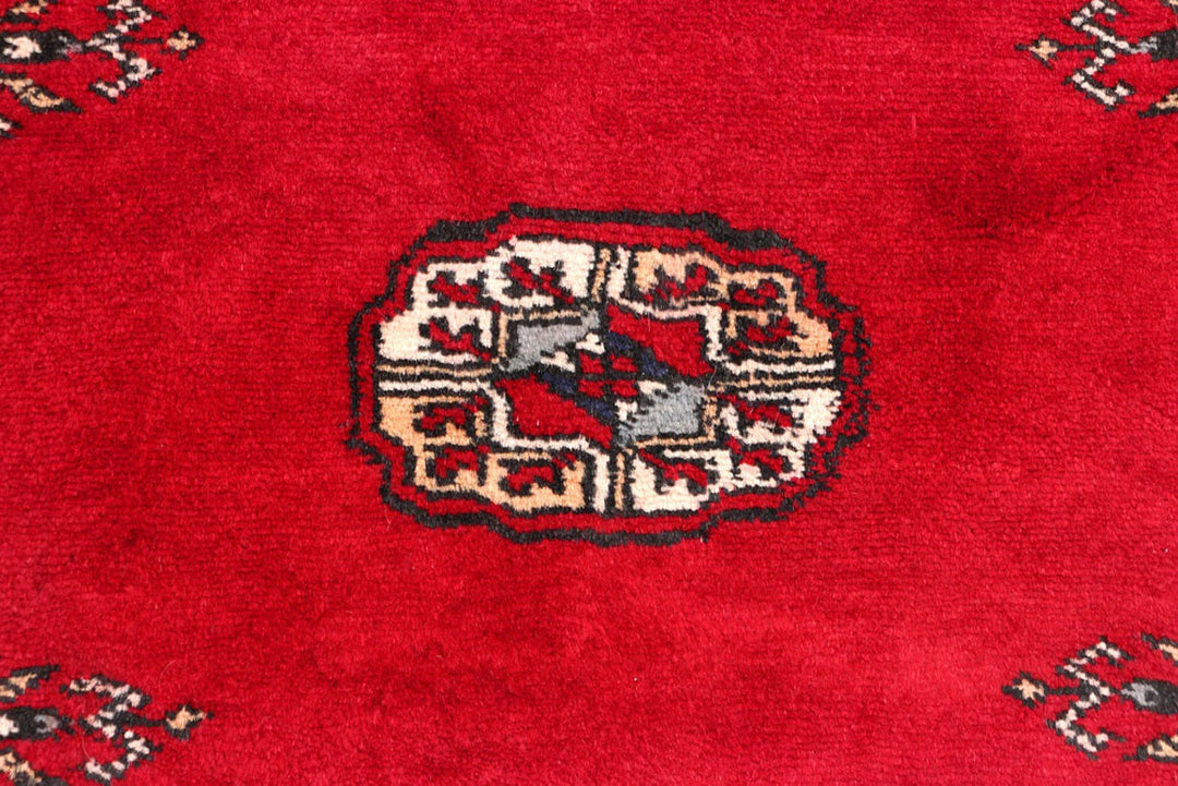 Dark Red Pakistani Bokhara Rug 2' 7" x 8' 8" Hand-Knotted | No. QA42764