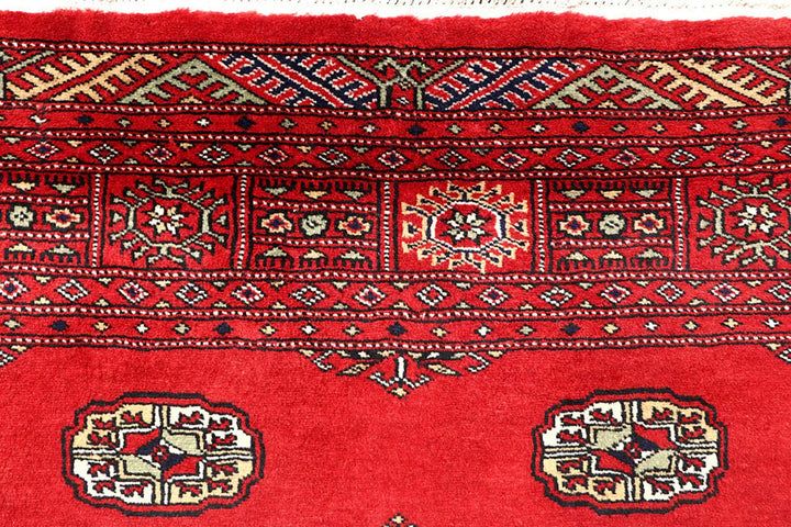 Red Pakistani Bokhara Rug 5' x 8'6" Hand-Knotted | No. QA42962