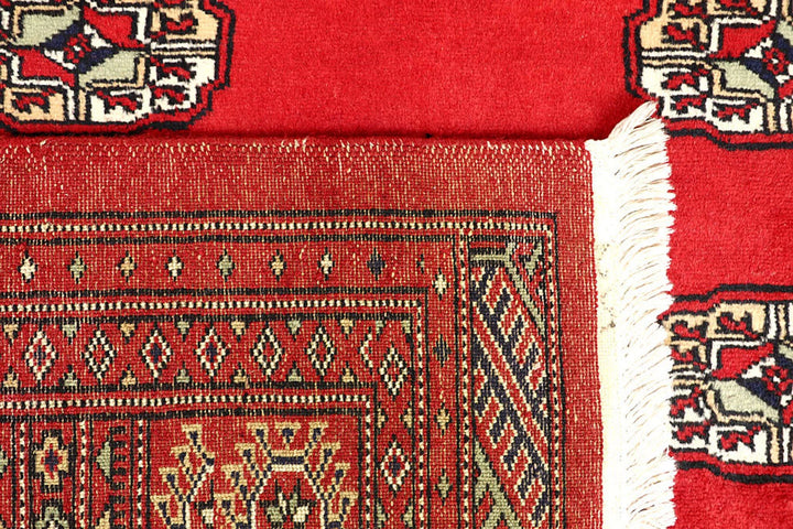 Red Pakistani Bokhara Rug 5' x 8'6" Hand-Knotted | No. QA42962