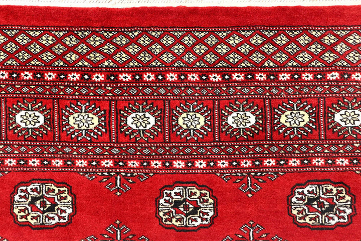 Red Pakistani Bokhara Rug 6' x 8'10" Hand-Knotted | No. QA43493