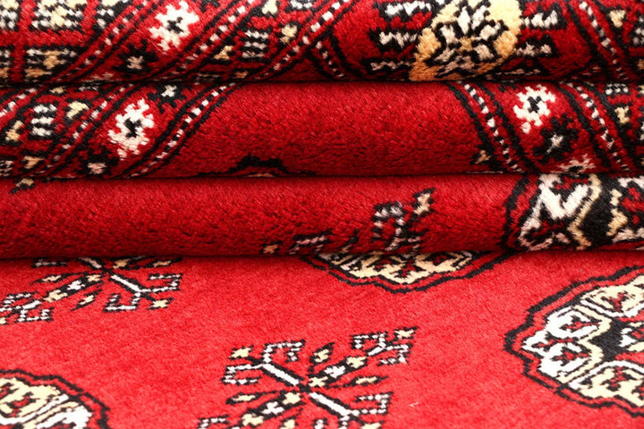 Red Pakistani Bokhara Rug 6' x 8'10" Hand-Knotted | No. QA43493
