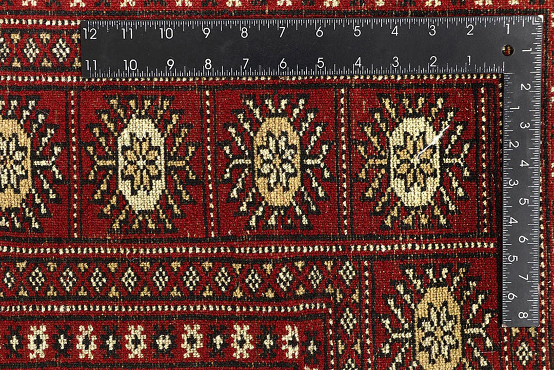 Red Pakistani Bokhara Rug 6' x 8'10" Hand-Knotted | No. QA43493