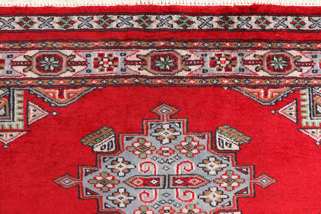 Red Pakistani Bokhara Rug 3' 3" x 5' 8" Hand-Knotted | No. QA43512
