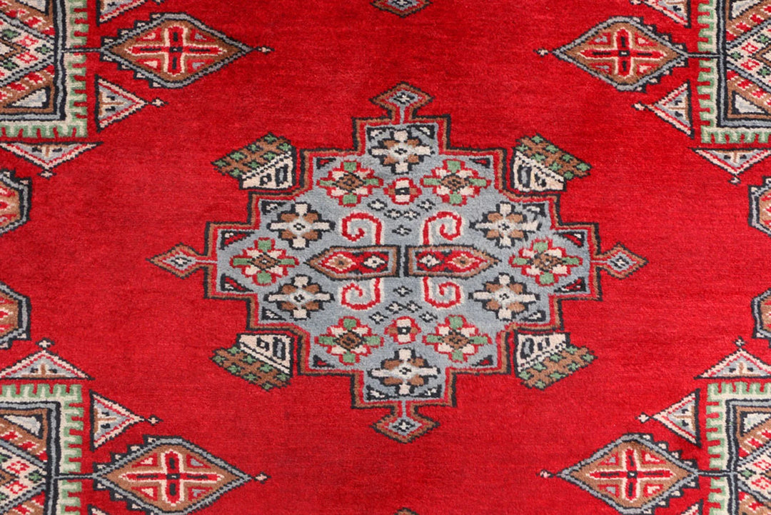 Red Pakistani Bokhara Rug 3' 3" x 5' 8" Hand-Knotted | No. QA43512