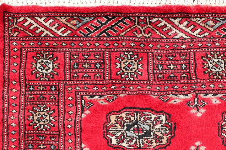 Dark Red Pakistani Bokhara Rug 3' 1" x 5' 2" Hand-Knotted | No. QA43628