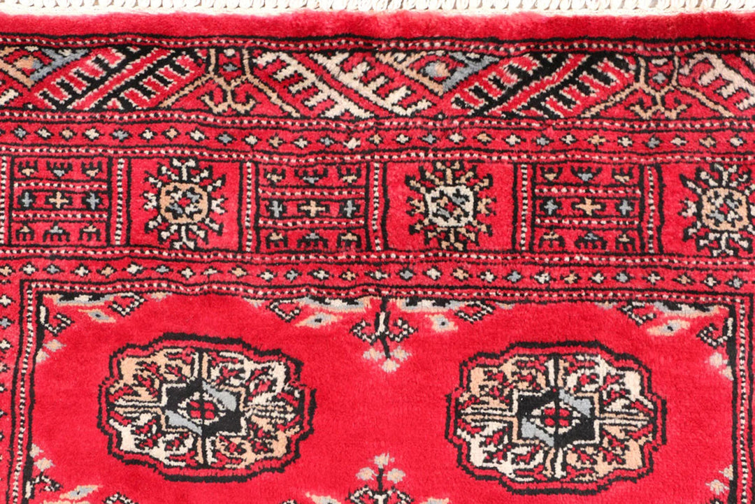 Dark Red Pakistani Bokhara Rug 3' 1" x 5' 2" Hand-Knotted | No. QA43628
