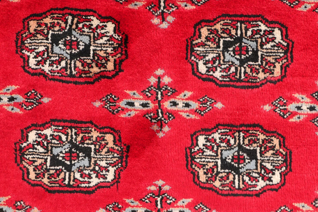 Dark Red Pakistani Bokhara Rug 3' 1" x 5' 2" Hand-Knotted | No. QA43628