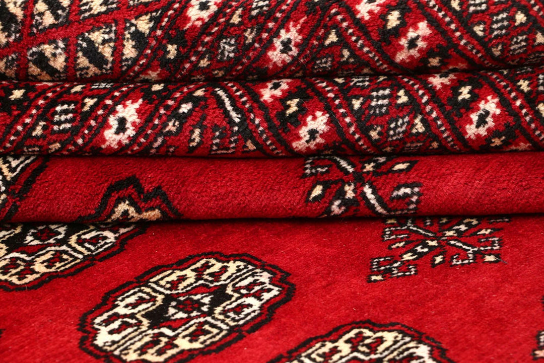 Red Pakistani Bokhara Rug 9' 4" x 12' 3" Hand-Knotted | No. QA43913