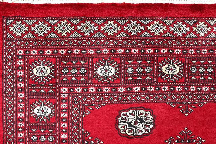 Firebrick Red Pakistani Bokhara Rug 5' 6" x 8' 2" Hand-Knotted | No. QA43944