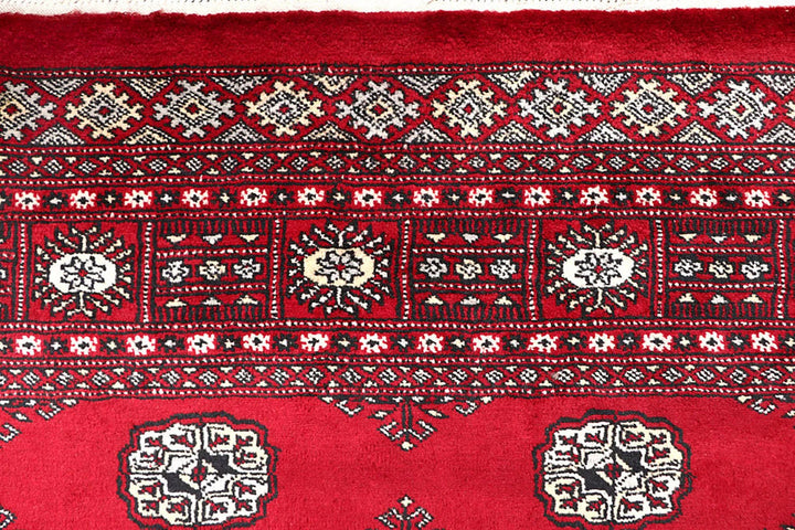 Firebrick Red Pakistani Bokhara Rug 5' 6" x 8' 2" Hand-Knotted | No. QA43944