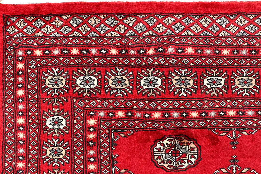 Red Pakistani Bokhara Rug 5' 8" x 8' 2" Hand-Knotted | No. QA44257
