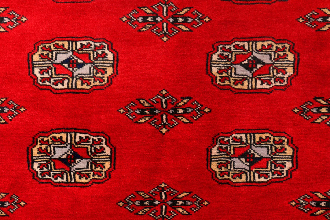 Red Pakistani Bokhara Rug 4' x 6' Hand-Knotted | No. QA44511