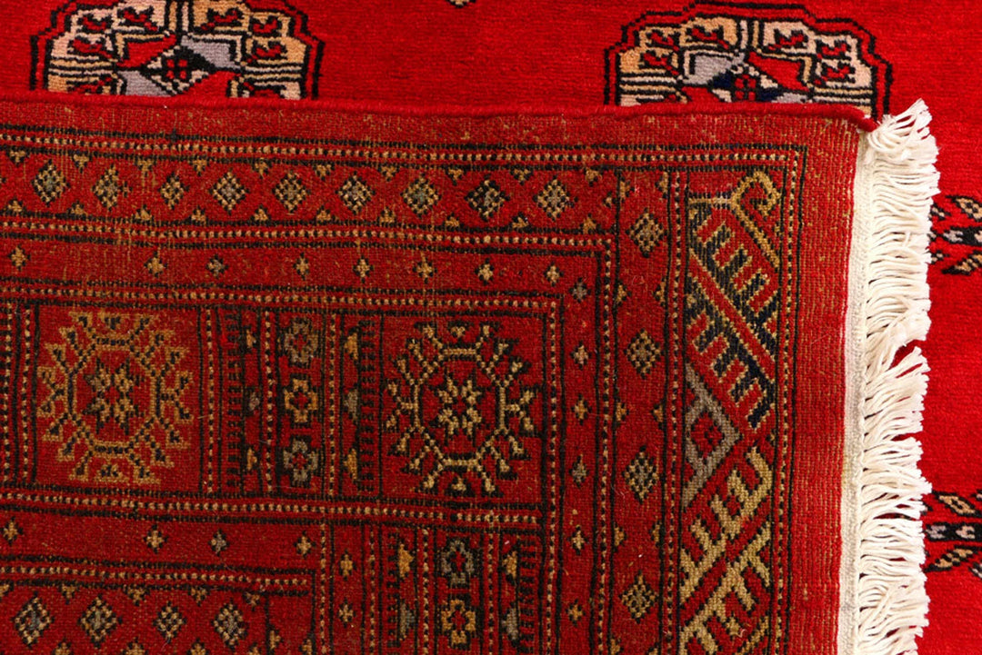 Red Pakistani Bokhara Rug 4' x 6' Hand-Knotted | No. QA44511