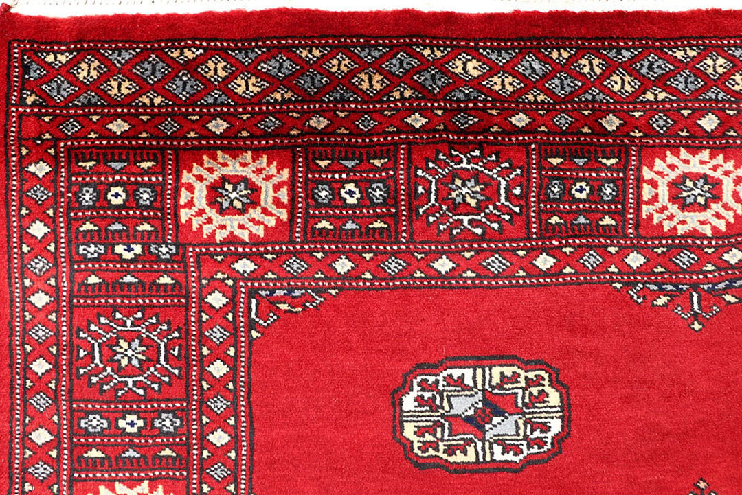 Red Bokhara Rug 4' 1" x 6' 7" Hand-Knotted | No. QA44607