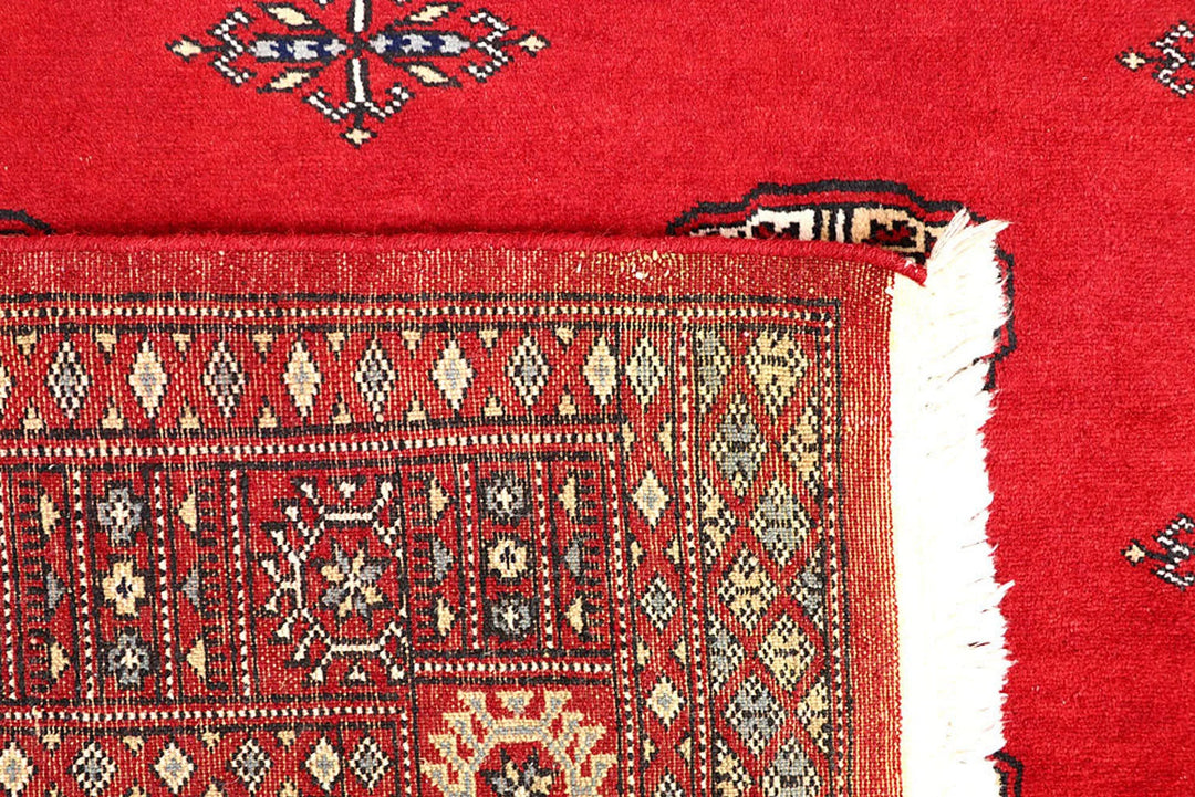 Red Bokhara Rug 4' 1" x 6' 7" Hand-Knotted | No. QA44607