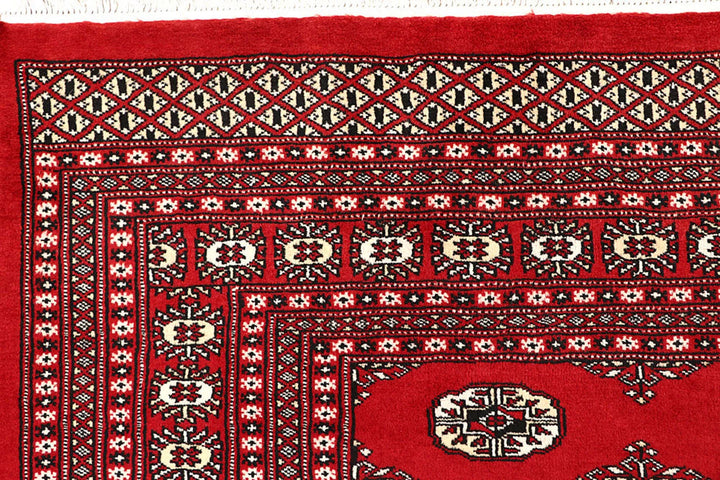 Red Pakistani Bokhara Rug 9' x 11'10" Hand-Knotted | No. QA45549