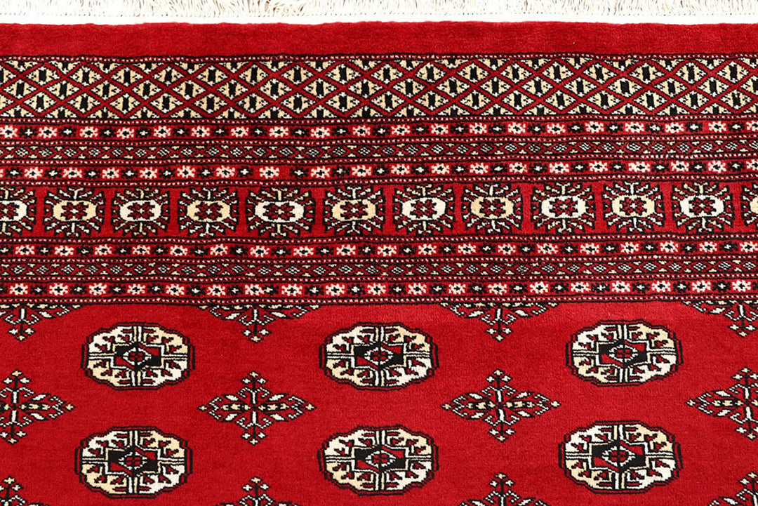 Red Pakistani Bokhara Rug 9' x 11'10" Hand-Knotted | No. QA45549